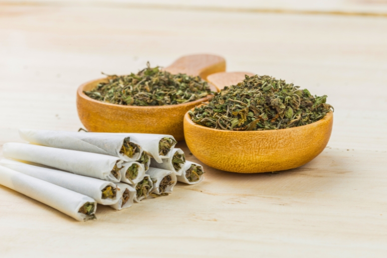 Pre-ground cannabis flower in a bowl.