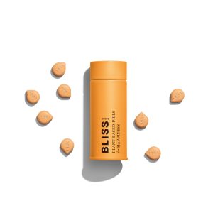 Bliss drops by 1906 are pictured on a white background. A cylindrical orange tin is in the middle of the image. Several Bliss drops are depicted around the container.