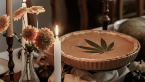 Pumpkin pie with a cannabis leaf on it.