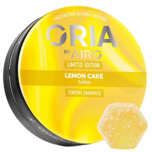 A container of Oria by Airo Lemon Cake Sativa terpene-enhanced cannabis gummies with a sugar-coated gummy in the foreground.